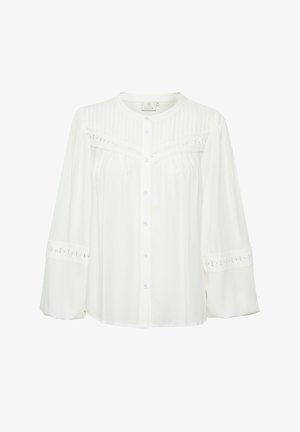 Balta ilgomis rankovėmis bluzė su apvaliu iškirpimu, mygtukų užsegimu priekyje ir raukšlėtu dizainu. Savybė yra nėrinių detalės ant rankovių ir bodice.