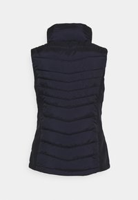 Námořnická modrá bezrukávová prošívaná vesta s vysokým límcem, zdobená šikmým proš�íváním a hladkou texturou, navržená pro izolaci.