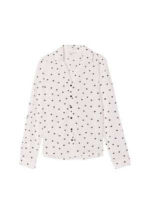 Chemise boutonnée à manches longues, blanche avec des motifs de cœurs noirs. Comprend un col et des poignets boutonnés. Tissu léger avec une texture lisse.
