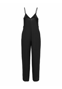 Mono negro con tirantes delgados ajustables, escote en V, corte holgado, piernas tapered y una textura suave. Diseño simple y minimalista sin adornos.