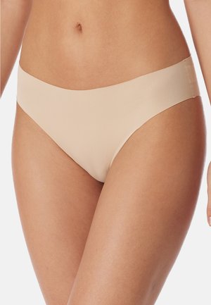 Beige seamless bikini bottom with a smooth texture, low-rise cut, and a wide elastic waistband. No visible seams or patterns.