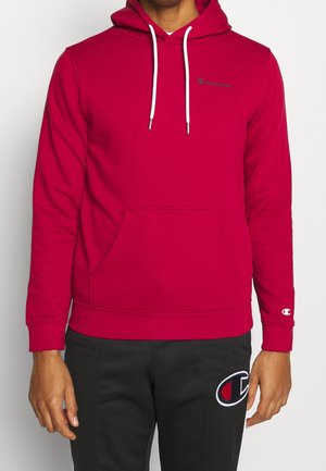 Felpa con cappuccio rossa in tessuto morbido, con tasca frontale, cappuccio regolabile con lacci e logo ricamato sul petto e sul polsino.