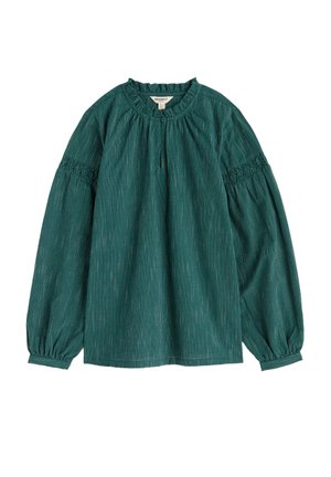 Blusa lunga a maniche cuffie di colore turchese realizzata in tessuto testurizzato con strisce verticali, presenta un collo alto, spalle arricciate e polsini elasticizzati.