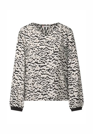 Lange mouw blouse in lichtbeige met een zwart abstract patroon. Voorzien van een V-hals, gathered schouders en elastische manchet. 