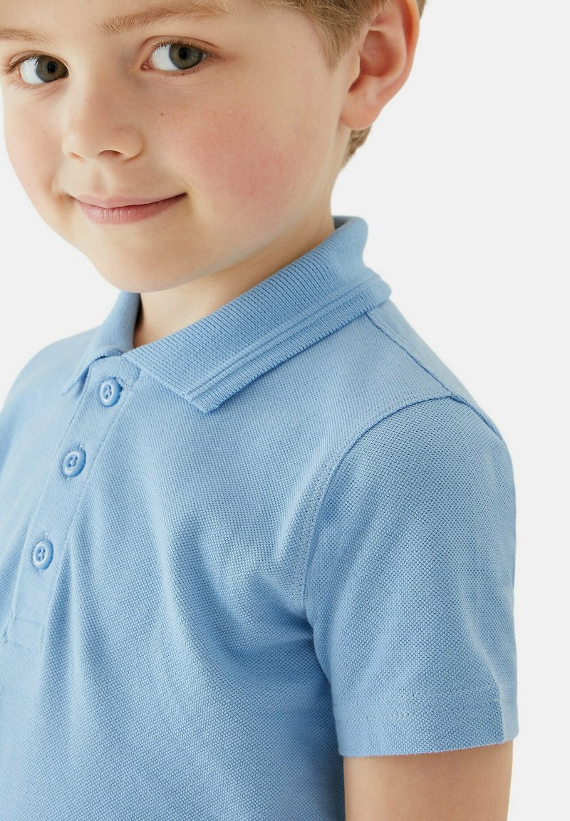 boys light blue polo shirt