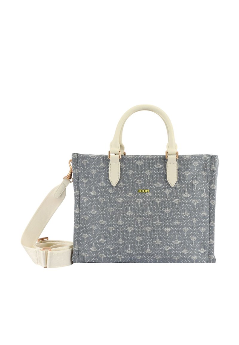Sac à main en tissu gris avec un motif répété. Il dispose de poignées en cuir blanc, d'une bandoulière amovible et d'un accent de logo jaune.