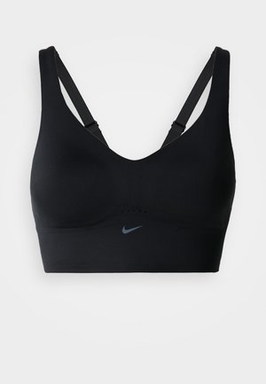 Juodas sportinis liemenėlė su V formos iškirpte, reguliuojamomis petnešėlėmis ir subtilia pilkos spalvos Nike logotipu. Pagaminta iš lygios, tamprios medžiagos.