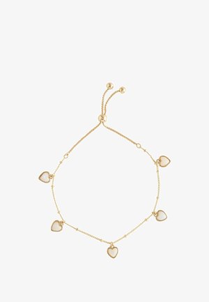 Next, REAL SHELL HEART DROP PULLEY BRACELET . - Armband - gold tone
