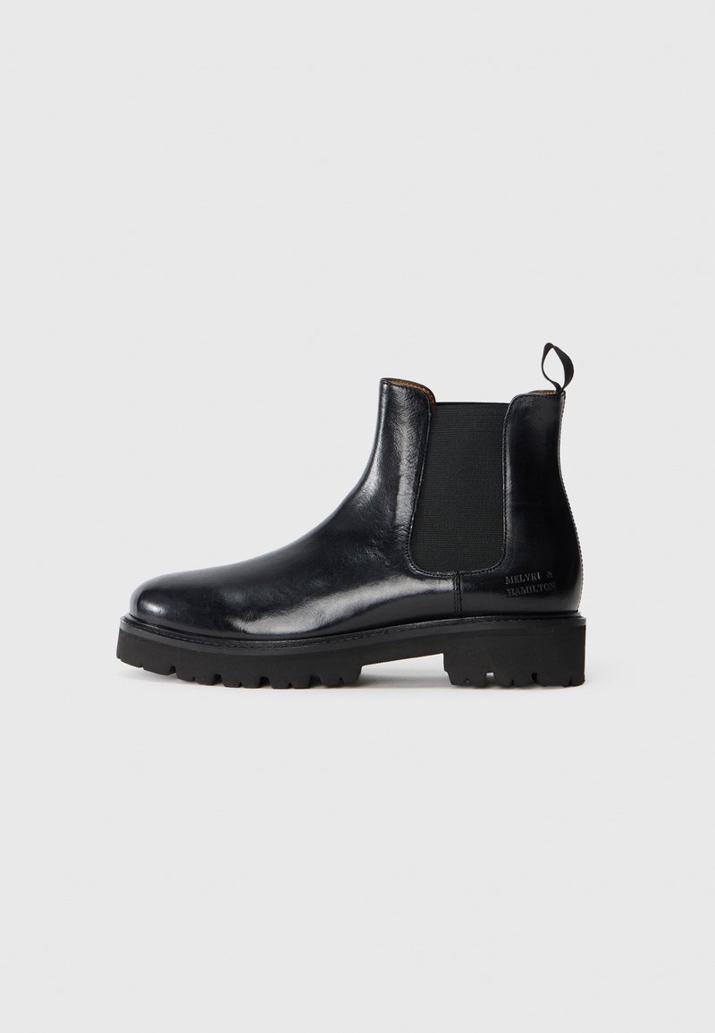 Botte Chelsea en cuir noir avec des panneaux élastiques sur les côtés, bout arrondi, semelle texturée et une languette au talon. Détails de marque minimalistes.