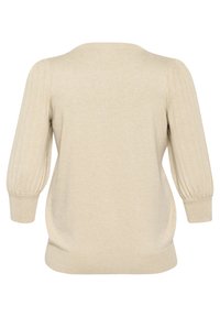 Beige gebreide trui met geribbelde ballonsleeves, ronde halslijn en een relaxte pasvorm. Zachte textuur met een gladde afwerking.