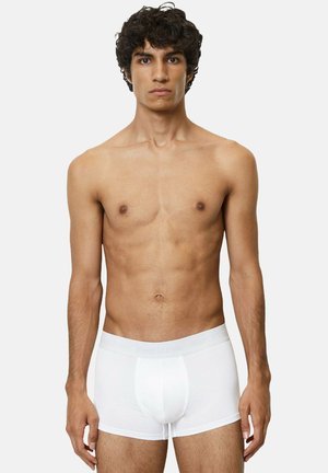 Weiße Baumwoll-Boxershorts mit einem weichen elastischen Bund, der dezente graue Markierungen aufweist. Glatte Textur mit einer enganliegenden Silhouette.