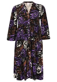 Lang kjole med blomstermønster i lilla, hvidt og brun på sort baggrund. Den har knapper foran og et bindebånd i taljen.