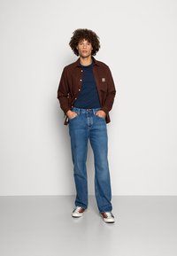 Nudie Jeans TUFF TONY - Calças de ganga de corte relaxado - coastal worn