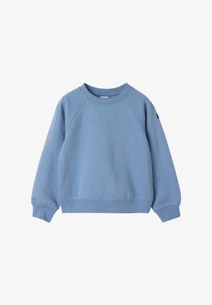 Lichtblauwe trui van zachte stof met een ronde halslijn, geribbelde manchetten en een losse pasvorm. Uitgevoerd met raglanmouwen en zijdetails.