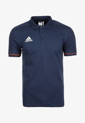 Polo Adidas bleu marine avec trois boutons, logo blanc sur la poitrine et bordure orange sur les manches courtes.
