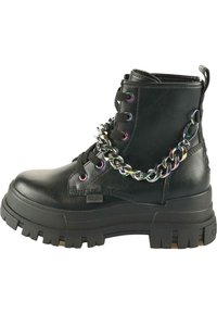 Black leather ankle boot with a chunky sole, featuring a chain detail across the laces and metallic eyelets. Durable and textured material.