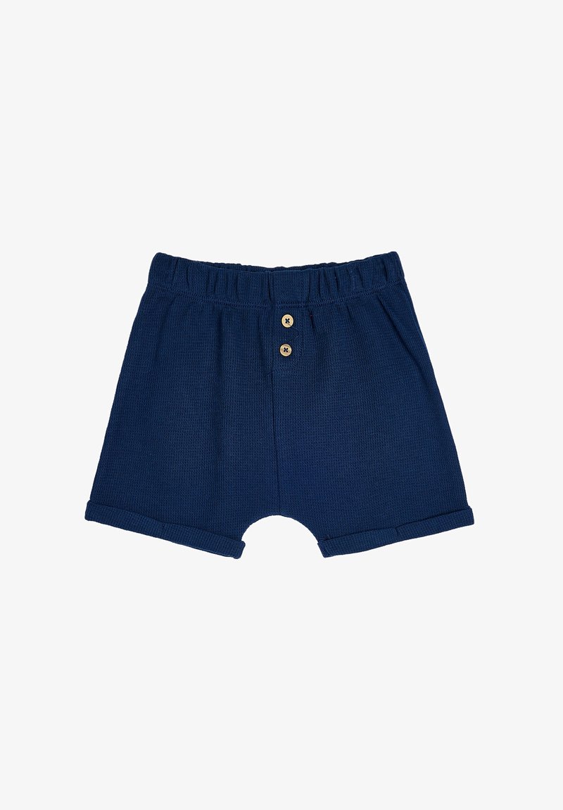Mørkeblå strikkede shorts med elastisk talje, to træknapper foran og oprullede kanter ved benene.