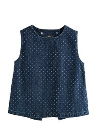 Top sin mangas de denim en azul oscuro con un patrón de puntos. Escote redondo, cierre a presión en la parte posterior y corte recto con aberturas laterales.