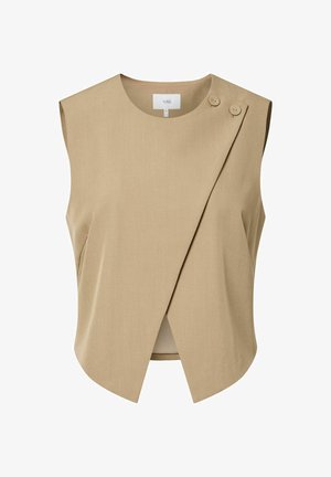 Gilet beige sans manches avec un chevauchement asymétrique sur le devant et deux boutons sur l'épaule droite, étiqueté "YAS."
