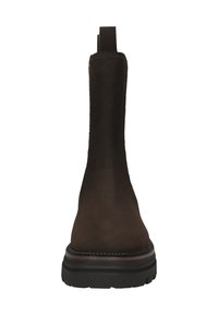 Brown leather chelsea boots with a sturdy rubber sole, elastic sides, and a rear pull tab for easy wear. Smooth matte finish, low-profile design.