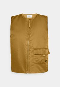 Mustard yellow padded vest with a high neck, zip closure, and a front pocket. Smooth texture and lightweight design enhance usability.