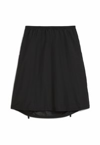 Jupe noire en A avec taille élastique, texture légère et ourlet arrière légèrement plus long. Pas de motifs ou d'accents visibles.