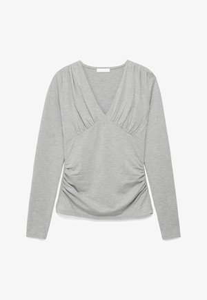 Helehall pikkade varrukatega särk sügava V-kaelusega, rinnal ja külgedel kogutud kangaste detailidega, valgel taustal laotatuna.