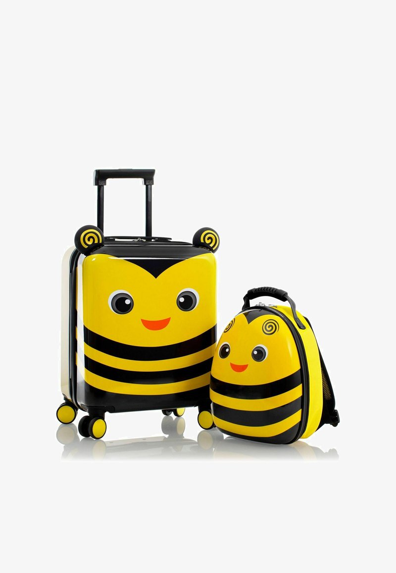 Valigia e zaino a tema api gialle, entrambi con strisce nere, volti sorridenti e dettagli a spirale. Superficie rigida con ruote.