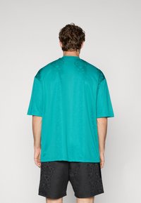adidas Sportswear TIRO TEE - Marškinėliai su spaudiniu - pure teal/black