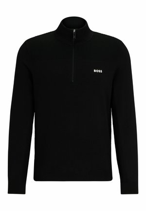 Svart kvartdragkedjesweater i mjukt material. Har ribbad textur på axlarna och en liten vit logo på bröstet.