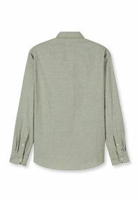 Langärmeliges Hemd aus hellgrünem Stoff, mit Knopfkragen, Rückenpasse und Ärmelmanschetten mit dezenten Steppakzenten.