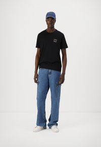 Tommy Hilfiger STACK - Print T-shirt - black