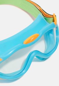 Blue swim goggles with orange and green accents. Smooth silicone material, curved shape, clear lenses with a single-button detail.
