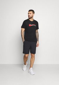 Nike Performance Camiseta estampada - black