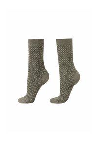 Chaussettes vertes texturées avec un motif en losange, une cuff côtelée et un orteil renforcé. Fabriquées en matériau doux pour le confort et la durabilité.