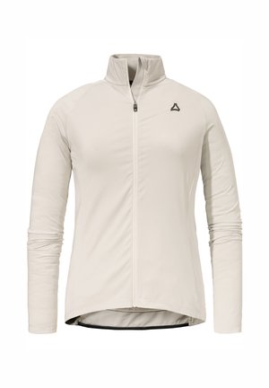 Light beige jacket featuring a high collar, full front zipper, long sleeves, and a black logo on the upper left side. Smooth texture.