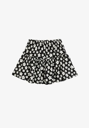 Zwarte skaterskirt met een wit bloemendessin, voorzien van een gerimpelde zoom en een elastische tailleband voor comfort en draaggemak.