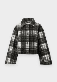 Cropped jacket made from black and white plaid wool, featuring a collar, long sleeves, and front buttons. Textured, with a checked pattern.