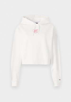 Moletom cropped branco com um logo de coração rosa no peito, mangas longas e capuz ajustável com cordão. Tecido macio e punhos canelados.
