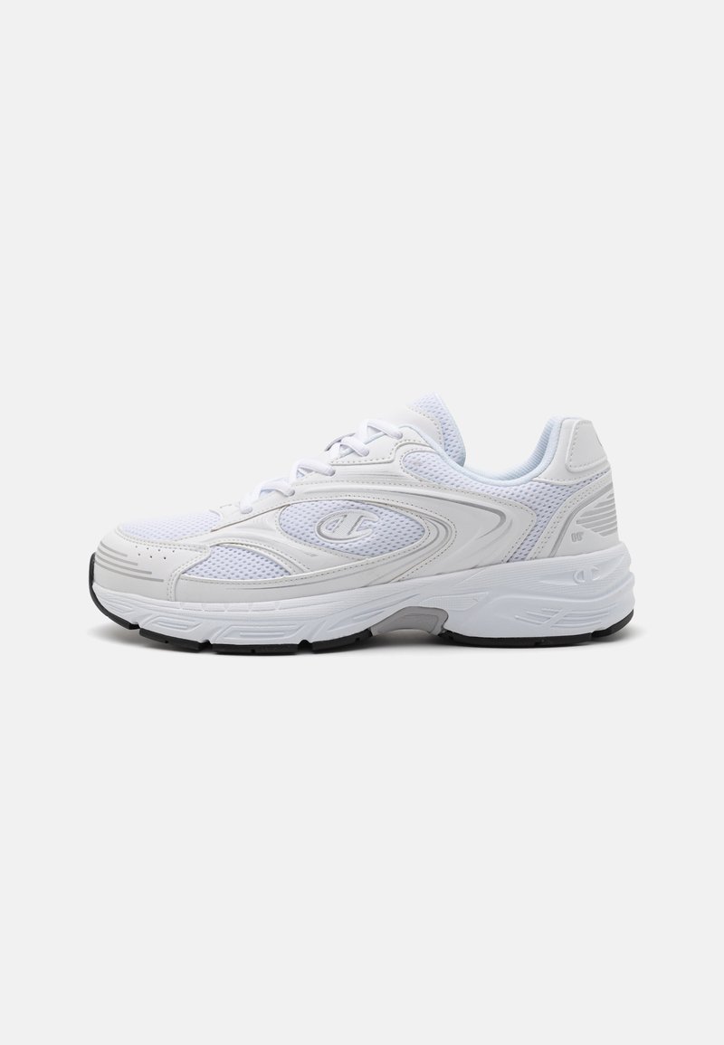 White athletic sneakers with mesh and synthetic upper, rounded toe, lace closure, cushioned sole, and black rubber outsole.