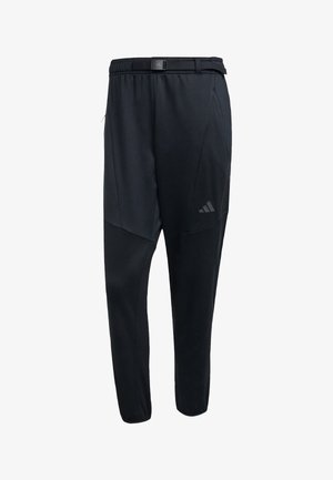 Schwarze Sporthosen mit taillierter Passform, elastischem Bund und Gürtel sowie Seitentaschen. Aus glattem Synthetikstoff gefertigt.