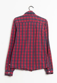Red and navy checkered long-sleeve shirt with button-up front, collar, and side slits. Made of woven fabric, smooth texture, and casual design.