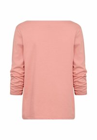 Langærmet top i blød pink bomuld med et bredt halsudskæring og tætsiddende ærmer. Ryggen er udekoreret, hvilket understreger et enkelt design.