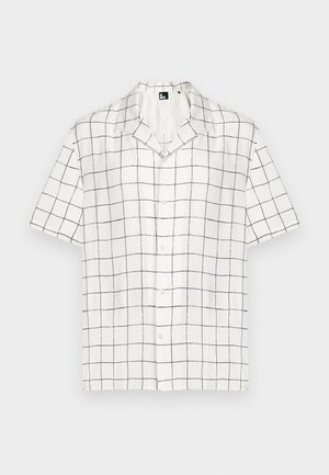 Kortsleeve skjorte med krage i hvitt stoff med et svart rutenettmønster, med knapper nedover fronten og en avslappet passform.
