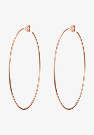 Boucles d'oreilles créoles en or rose avec une forme circulaire fine. Fini en métal lisse, dotées d'un fermoir sécurisé en haut pour un port facile.