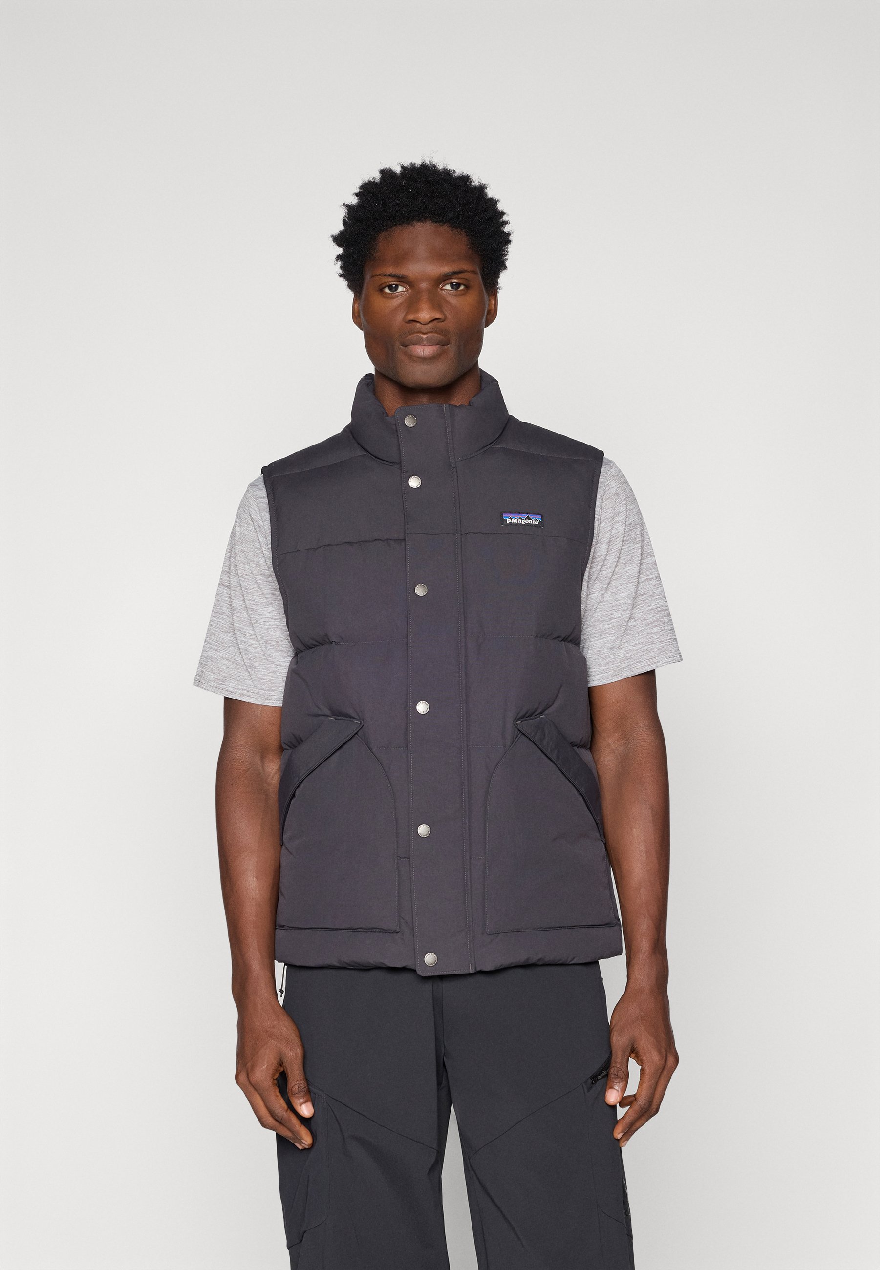 patagonia vest over dress shirt Patagonia Will Not Comment on the Finance Bro Vest Controversy