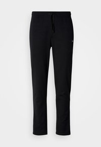 Black sweatpants made of soft fabric, featuring an elastic waistband with a drawstring and a slim fit design. No visible patterns or accents.