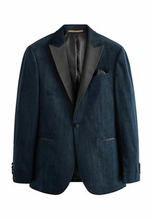 Mörkblå sammetsblazer med mönstrad textur, svarta satinrevers, enkel knappstängning och två framfickor. Noterbart fickkvadrat ingår.