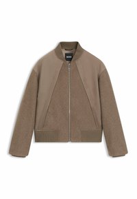 Ruskea pommikoneen takki, jossa on yhdistelmä teksturoitua villaa ja sileää kangasta, ribatut hihansuut ja helma sekä etuvetoketjukiinnitys.