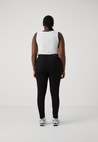 Levi's® Plus 721™ HIGH RISE SKINNY - Jeans Skinny Fit - long shot